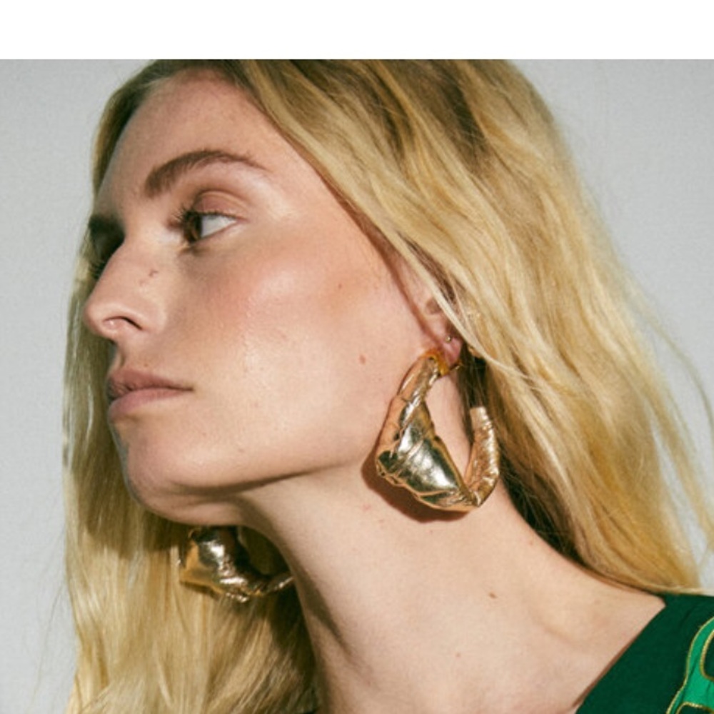 Large leather metallic earrings